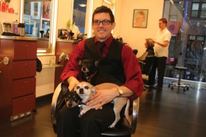 Mark Garrison takes a little break with his well groomed dogs at his pet-friendly salon.