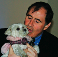 It was a dog's life in Richard Kind's arms for Lucky.