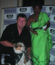 Voodoo Priestess Miriam in fetching green, and Louisiana Music Commissioner Bernie Cyrus with a furry guest.