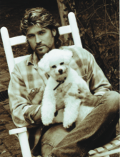 Billy Ray Cyrus holds his four-legged country companion